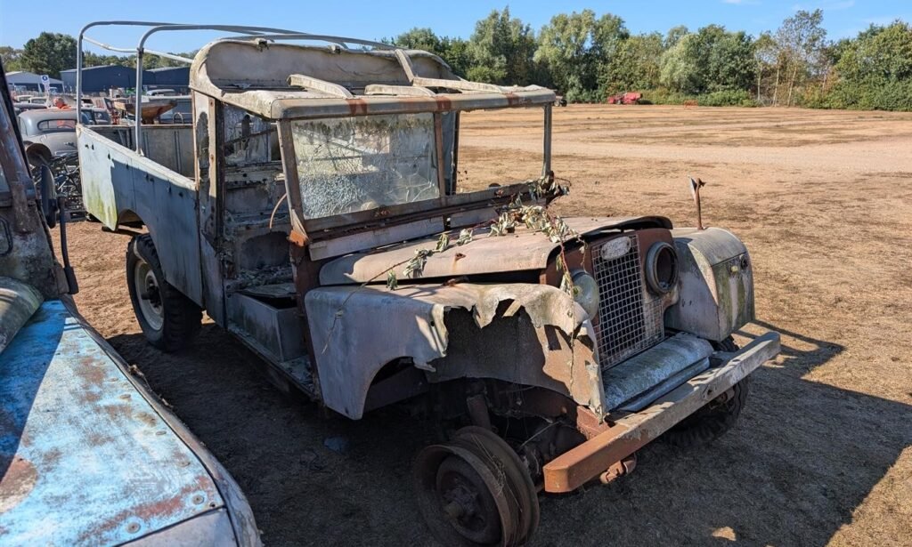 A hoard of more than 150 classic cars, tractors and boats unseen for decades has been found hidden across six Bedfordshire barns - and could fetch £250,000 at auction.