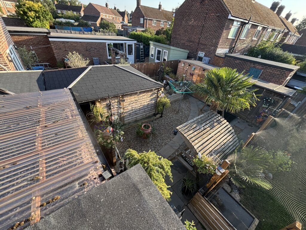 A couple have spent £25,000 turning their council house garden into a paradise with an aviary, spa, outdoor kitchen and gym - even the housing officer was stunned.