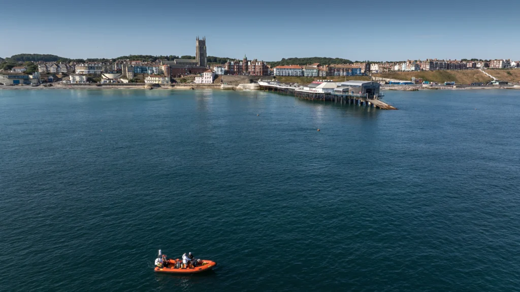 Divers have found 25 mystery structures off Cromer from a British town swallowed by the sea 700 years ago - and the discovery could debunk a famous legend.