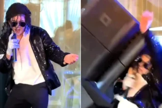 A Michael Jackson tribute act was nearly crushed by a falling speaker mid-Billie Jean at a wedding - with the moment caught in a window reflection.