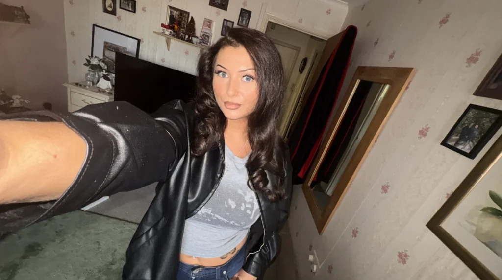 A 23-year-old born in the noughties says she is stuck in the forties - decking out her council flat in wartime décor and styling herself with 1940s pin curls.