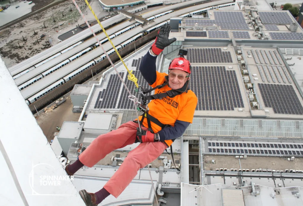 A 93-year-old has raised more than £35,000 by ziplining 300 metres across the seafront - all in honour of his wife of 68 years, who has Alzheimer's.