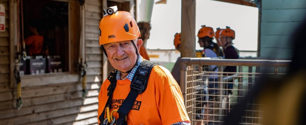 A 93-year-old has raised more than £35,000 by ziplining 300 metres across the seafront - all in honour of his wife of 68 years, who has Alzheimer's.