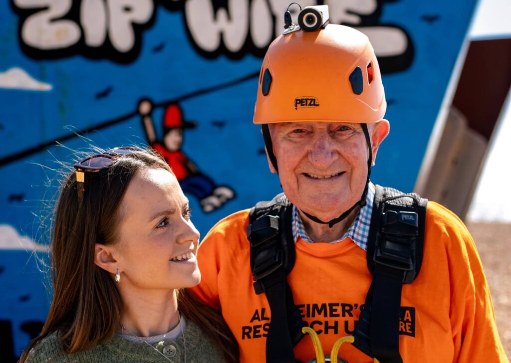 A 93-year-old has raised more than £35,000 by ziplining 300 metres across the seafront - all in honour of his wife of 68 years, who has Alzheimer's.