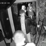 Watch the moment a man yanks open a bar door - only for the glass to explode into shards, leaving him frozen in the doorway still gripping the handle.