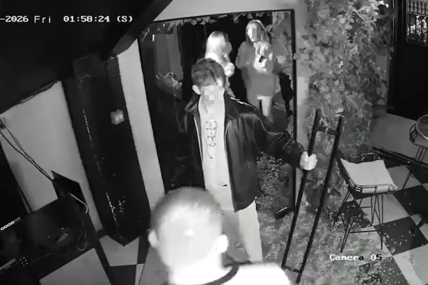 Watch the moment a man yanks open a bar door - only for the glass to explode into shards, leaving him frozen in the doorway still gripping the handle.