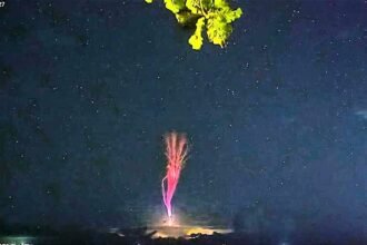 A rare red sprite has been filmed bursting above a storm off Taiwan, and officials say the under-a-second flash is the clearest their cameras have ever caught.