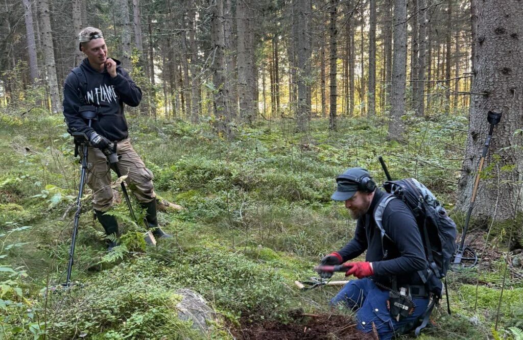 A treasure hunter who was about to give up has unearthed Finland's biggest ever Viking-era hoard - thousands of silver coins stashed in two birch-bark pots.