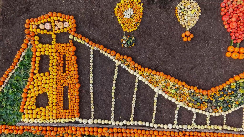 An iconic bridge built by Britain's most famous engineer has been recreated using thousands of pumpkins - all grown at a zoo using dung from its elephants.