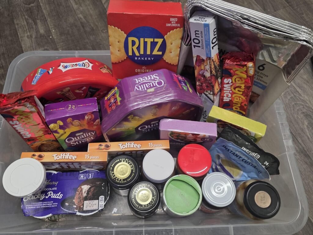 A mum-of-three dreading the cost of Christmas has revealed how she is spending just £5 a week to build a festive food box she hopes will be worth over £100.
