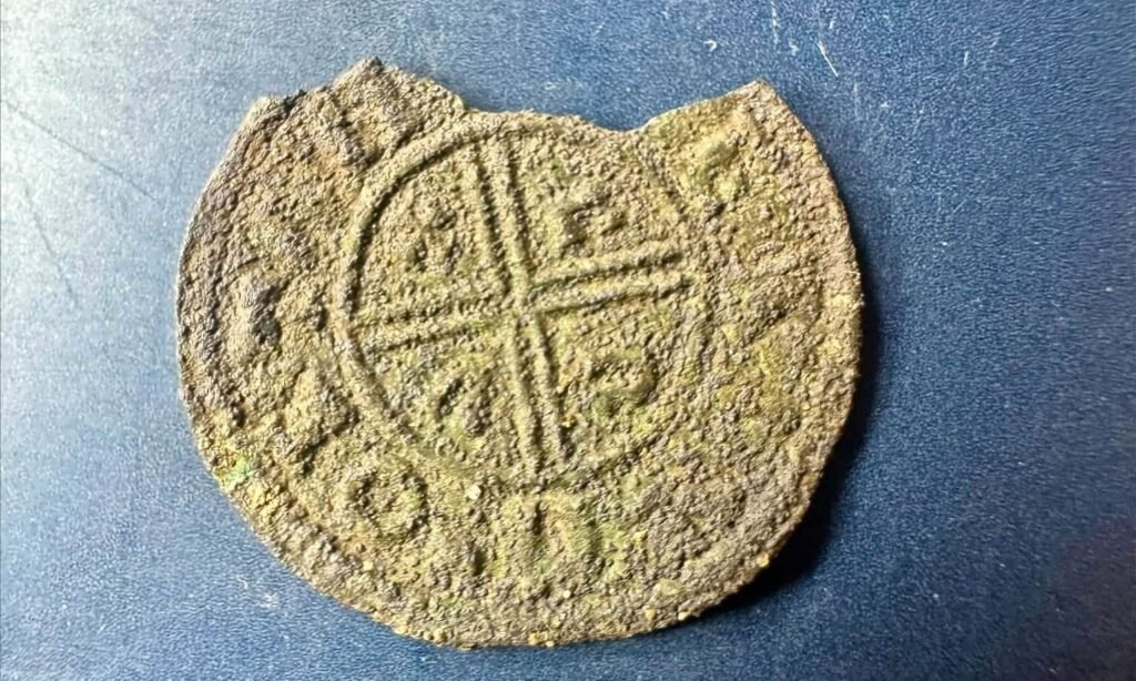 A 1,000-year-old coin linked to King Ethelred the Unready has been found in a coastal field - and it is the northernmost Anglo-Saxon coin ever found in the UK.