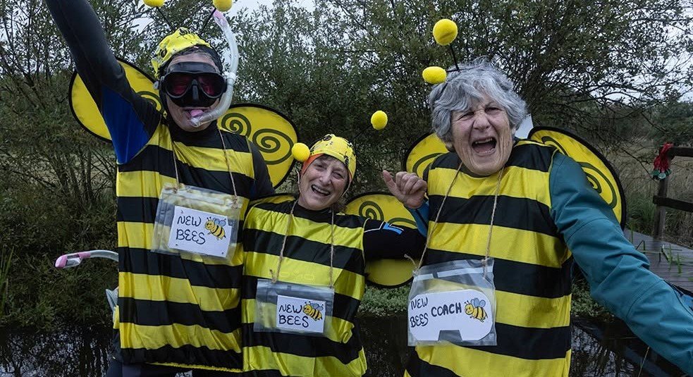 Daredevils dived headfirst into a filthy 120-yard bog as the World Bog Snorkelling Championships hit 40 years - with Emily Hall crowned champ in just 1:27.97.