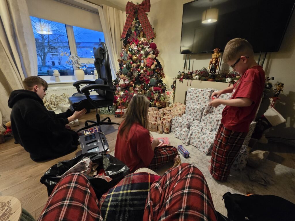 A single mum has 80 Christmas presents already wrapped and hidden in September - but trolls call her sick and say her kids will hate her for it.
