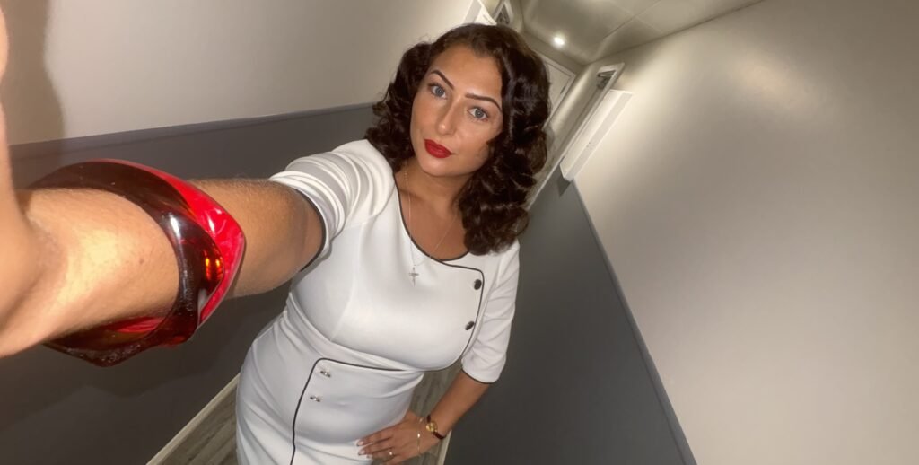 A 23-year-old born in the noughties says she is stuck in the forties - decking out her council flat in wartime décor and styling herself with 1940s pin curls.