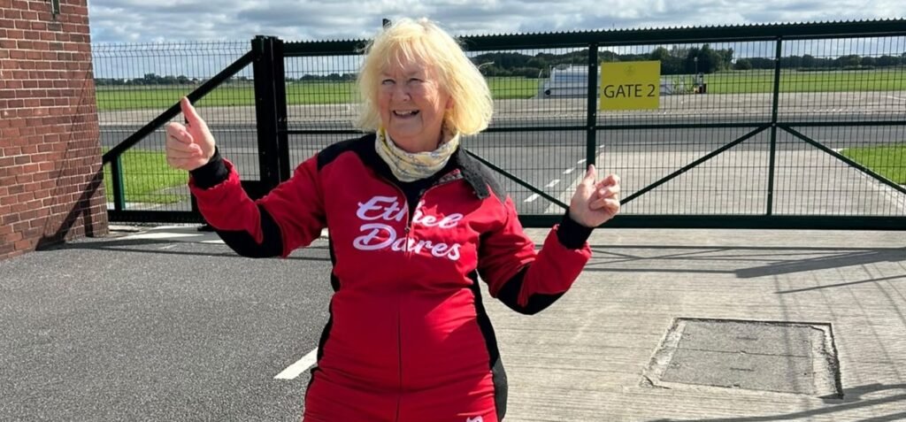 A daredevil gran has taken to the skies strapped to the top of a plane aged 80 - as her screaming grandchildren dubbed her 'Mad Nanna' and she raised £820 for charity.