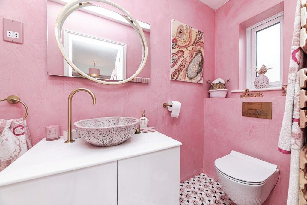A woman has spent £25,000 turning her home into a Barbie-style pink palace - with even her power drill matching - and now the rosy five-bed is on the market for £725,000.