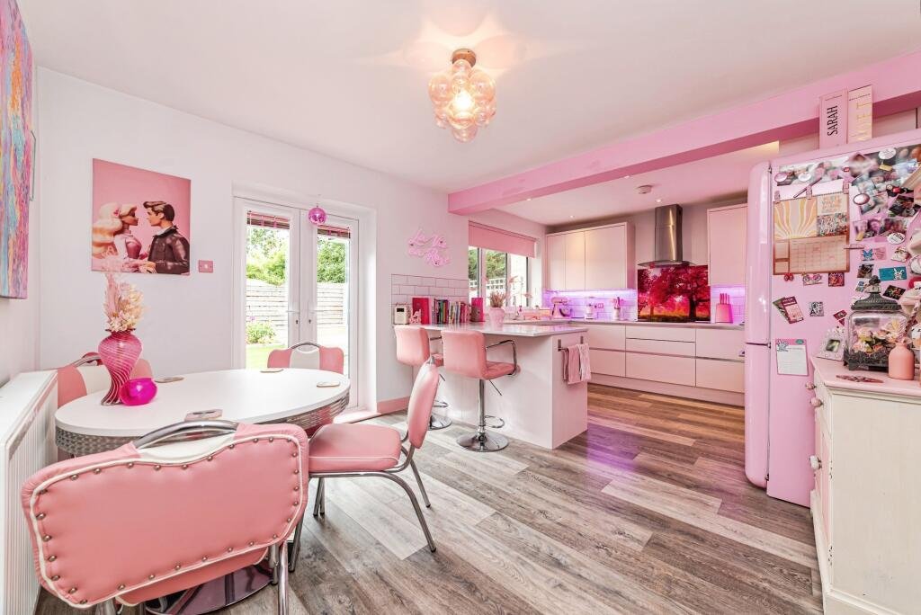 A woman has spent £25,000 turning her home into a Barbie-style pink palace - with even her power drill matching - and now the rosy five-bed is on the market for £725,000.