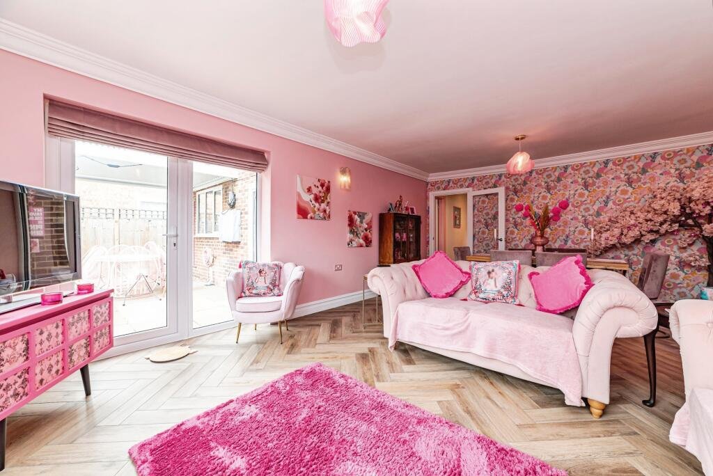 A woman has spent £25,000 turning her home into a Barbie-style pink palace - with even her power drill matching - and now the rosy five-bed is on the market for £725,000.