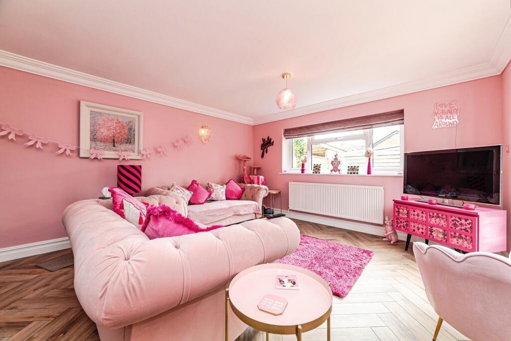 A woman has spent £25,000 turning her home into a Barbie-style pink palace - with even her power drill matching - and now the rosy five-bed is on the market for £725,000.