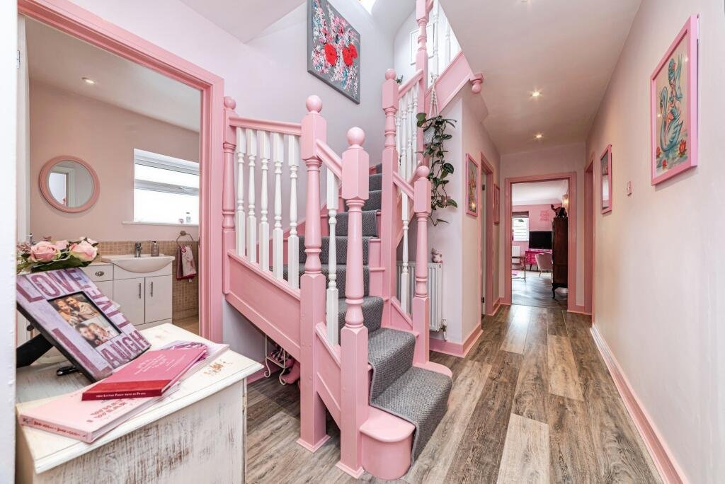 A woman has spent £25,000 turning her home into a Barbie-style pink palace - with even her power drill matching - and now the rosy five-bed is on the market for £725,000.