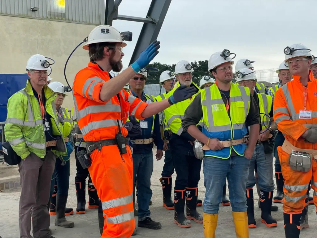 Britain's last deep tin mine prepares to reopen after 400 years as shanty singers perform 150ft underground in South Crofty, Cornwall, testing eerie acoustics.