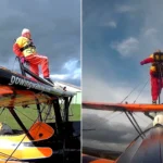 99-year-old Helga Duffy becomes world's oldest wing walker after strapping herself to plane. Inspired by another pensioner, she raised over £1,300 for charity.