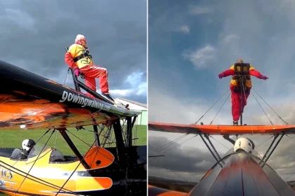 99-year-old Helga Duffy becomes world's oldest wing walker after strapping herself to plane. Inspired by another pensioner, she raised over £1,300 for charity.