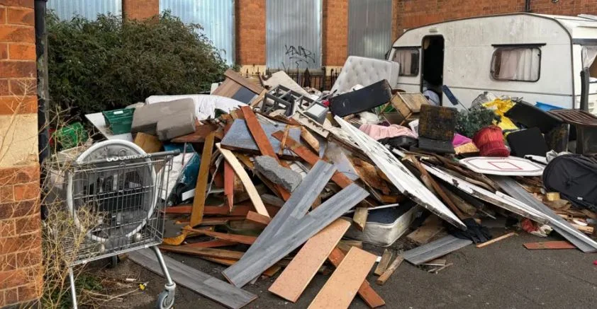 Brit residents have been left fuming as an ‘eyesore’ mountain of rubbish has been dumped on their street. Mattresses, sofas and household appliances were left strewn.