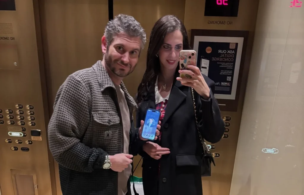 Ethan and Hila Klein together in an elevator mirror selfie.