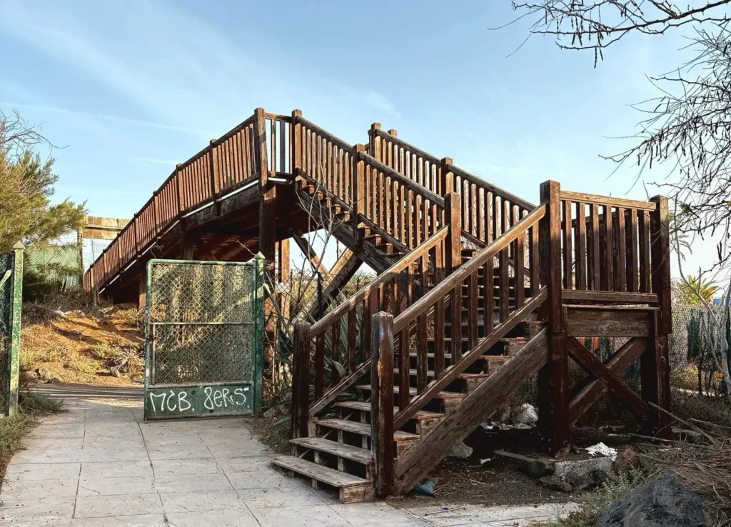 Eerie pictures reveal a former Spanish holiday attraction where sharks once swam, but now a giant graffiti-covered predator overlooks the decaying complex.