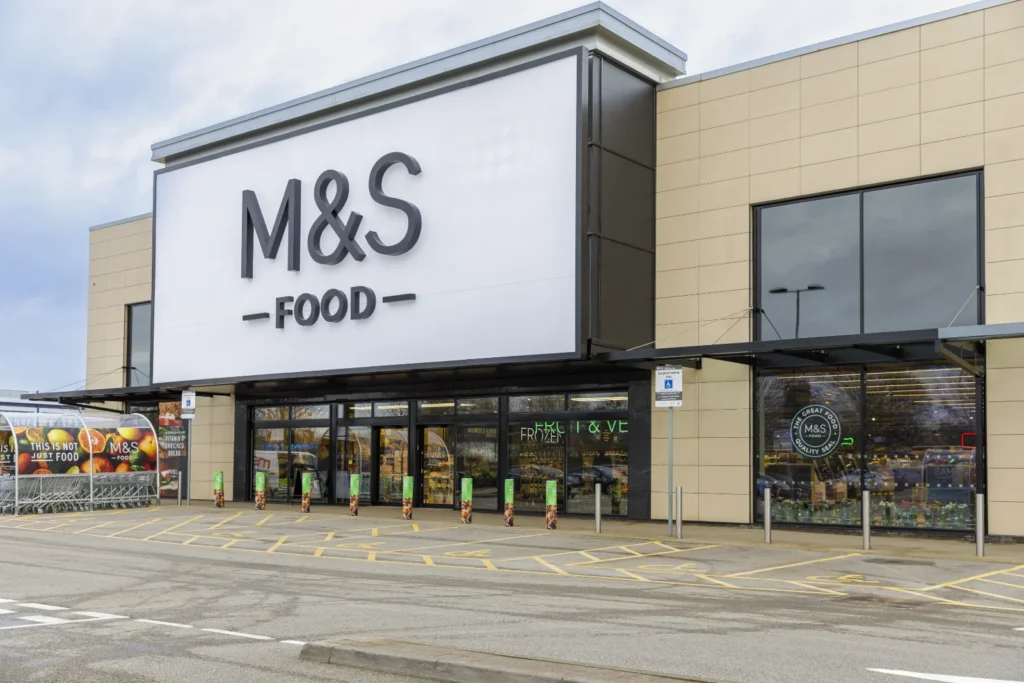 M&S launches Halloween Colin the Caterpillar with faces at both ends - spooky side features black cats and cauldrons. Limited-edition treat arrives in stores.