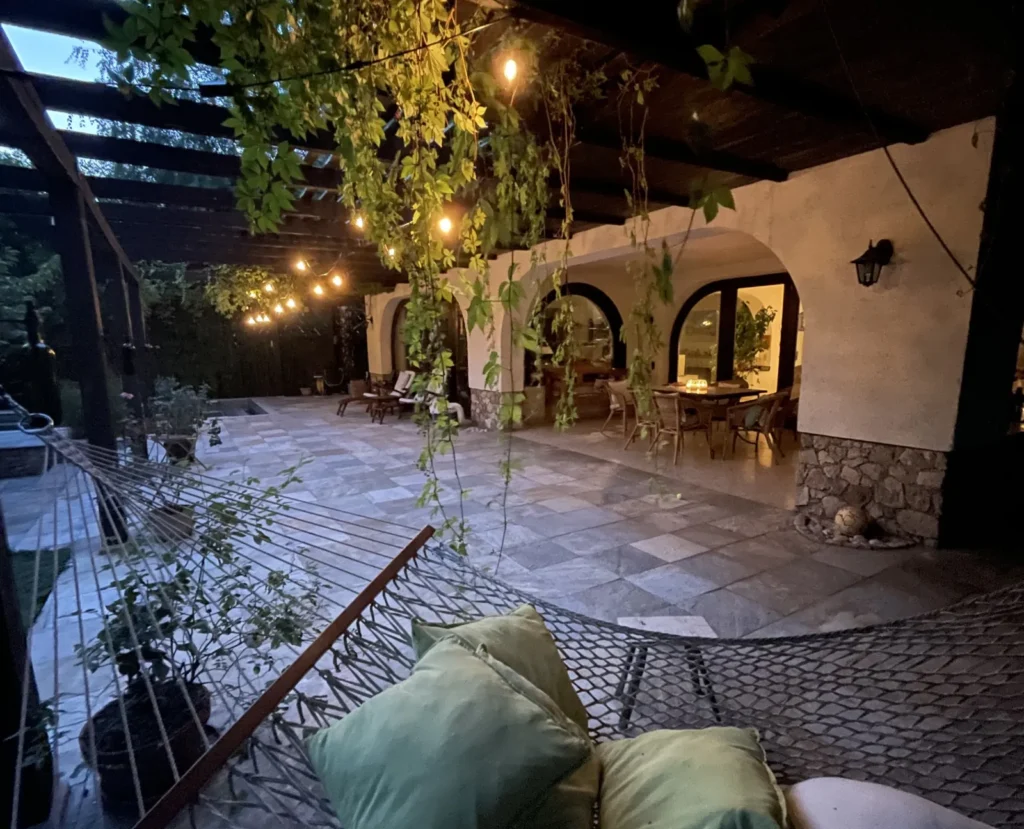 Young couple reveal how they travel the world for FREE by house-sitting in luxury homes - staying in 18 countries without paying for accommodation. Here's how they do it.