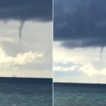A giant waterspout has been spotted off the British coast as wild weather sparked fears of tornadoes sweeping across the country.