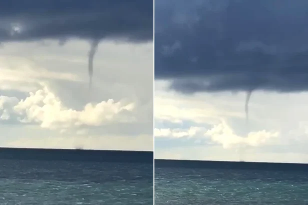 A giant waterspout has been spotted off the British coast as wild weather sparked fears of tornadoes sweeping across the country.
